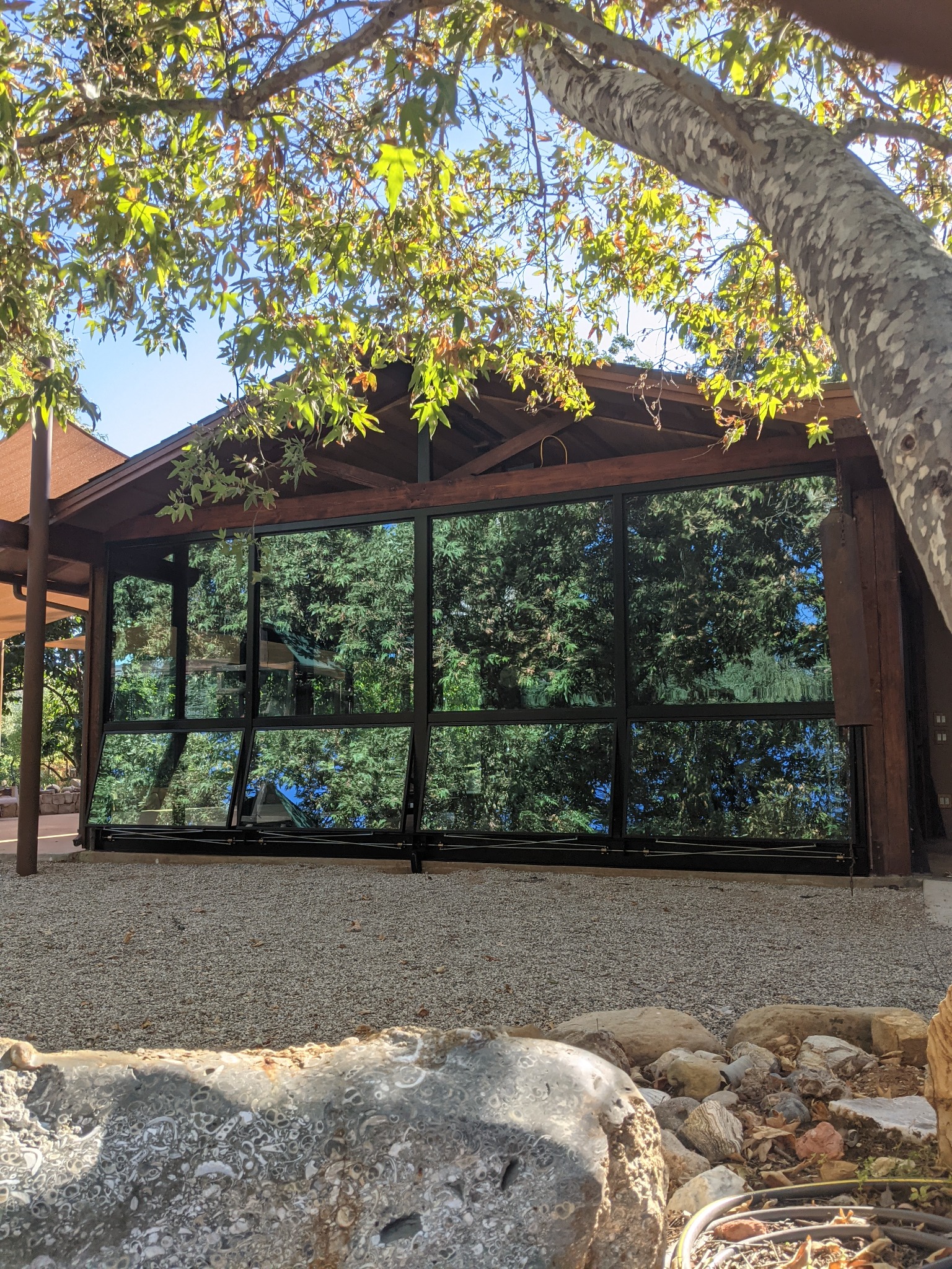 SPAN mechanical window wall installed beneath a timber roof
